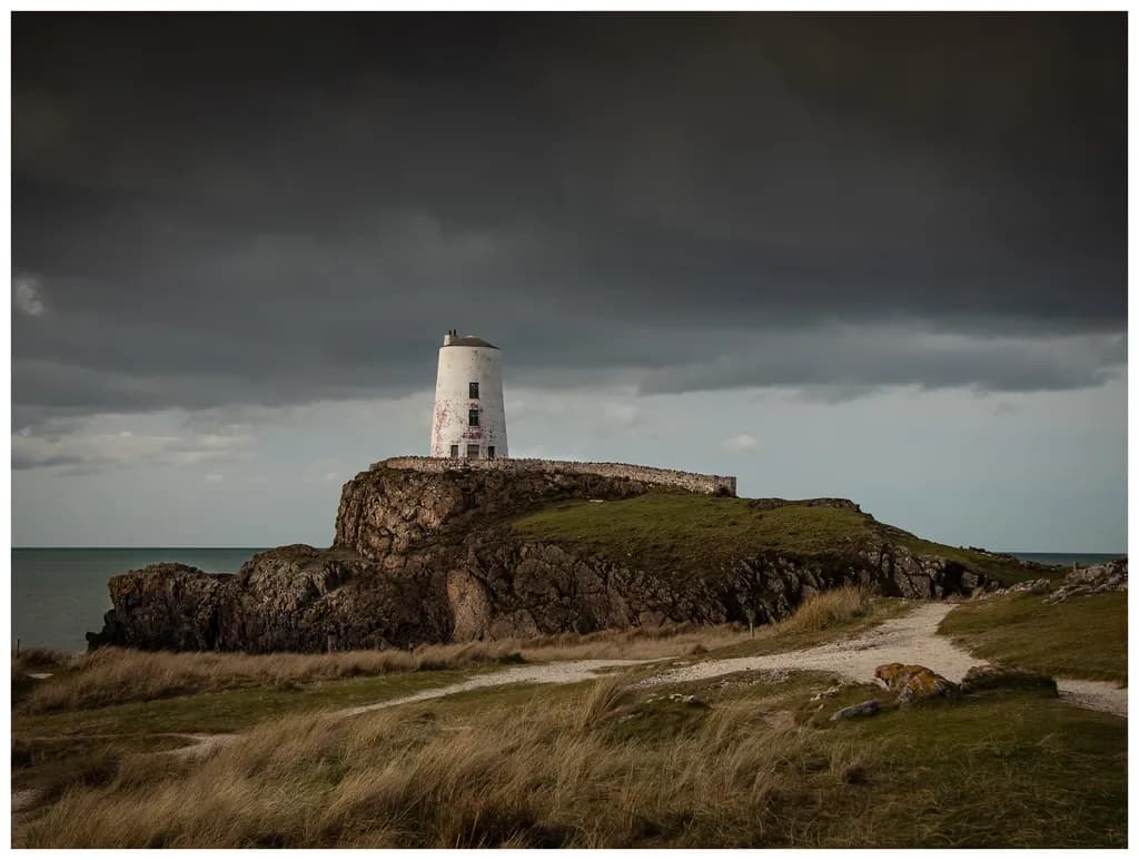 Lighthouse on Rocky Cliff