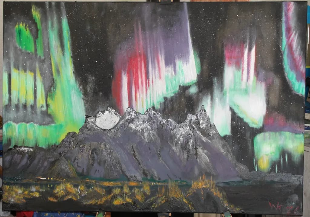 Northern Lights Over Mountains