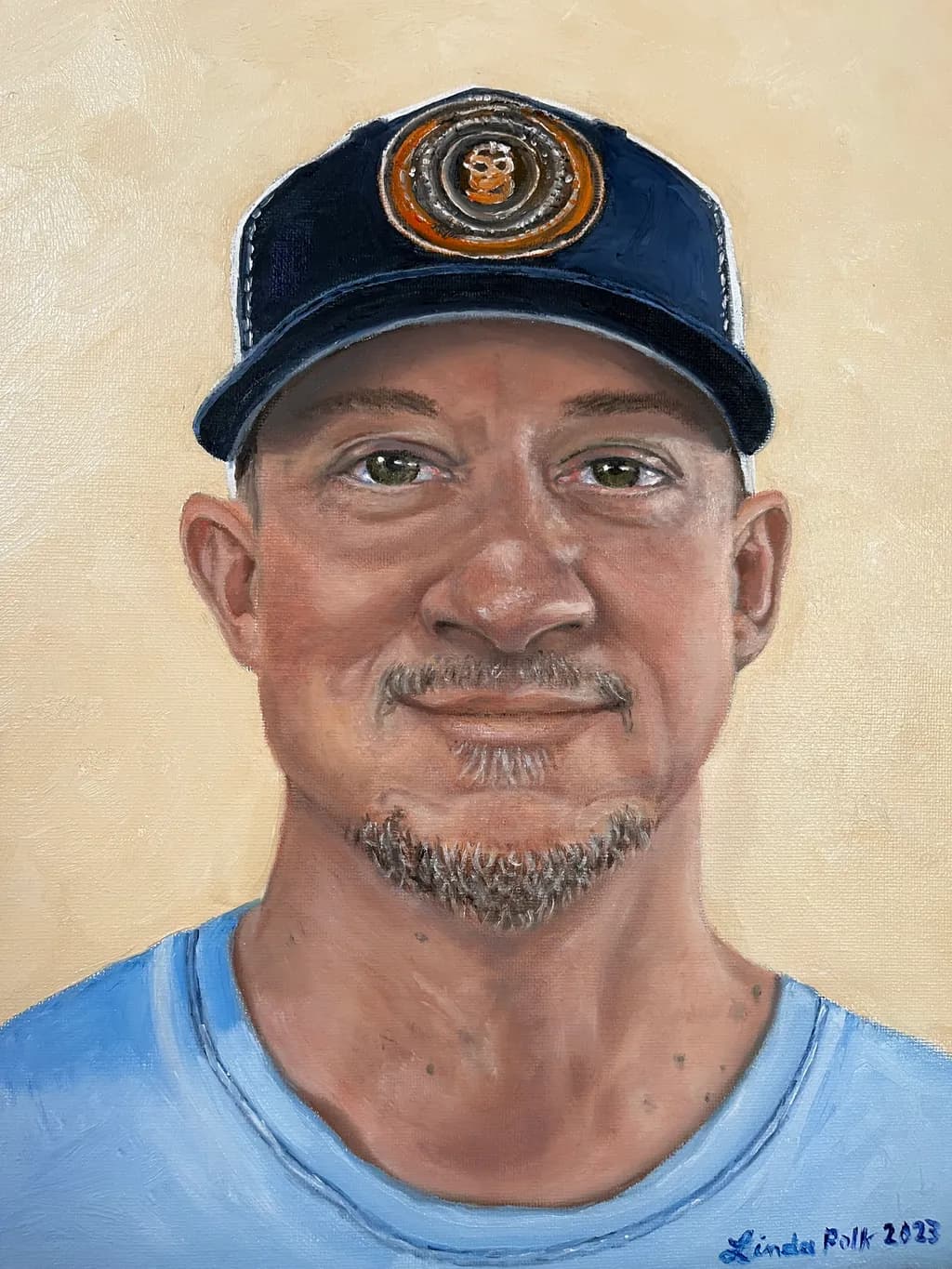 Man in Blue Shirt and Cap