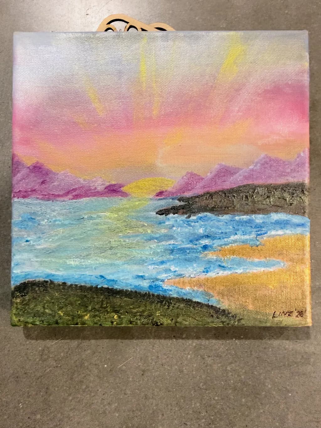 Sunset Over Mountains and Water