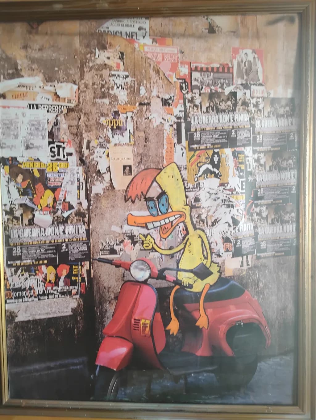 Duck on Red Scooter