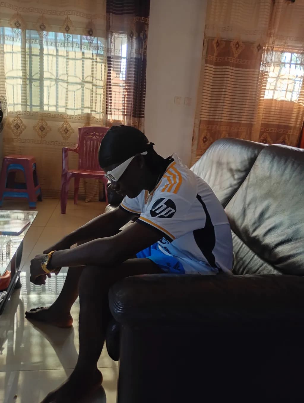 Reflective Moment on Sofa