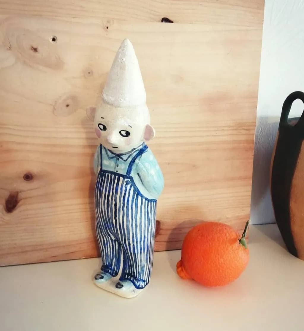 Ceramic Figure with Orange
