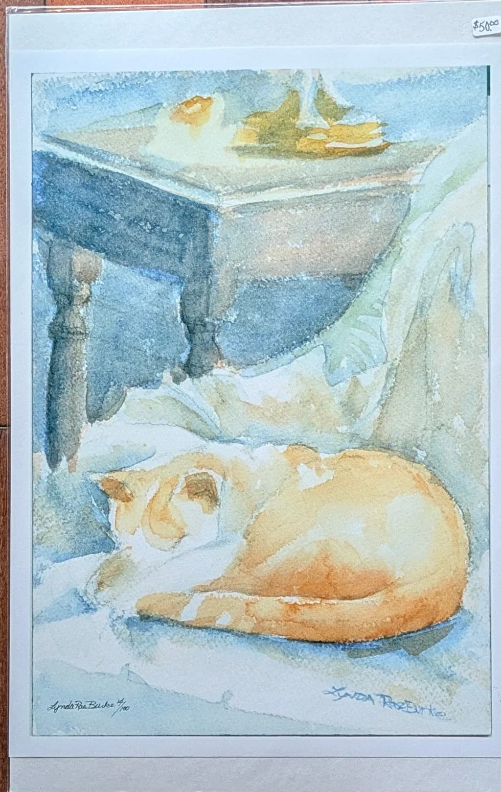 Sleeping Cat by Table