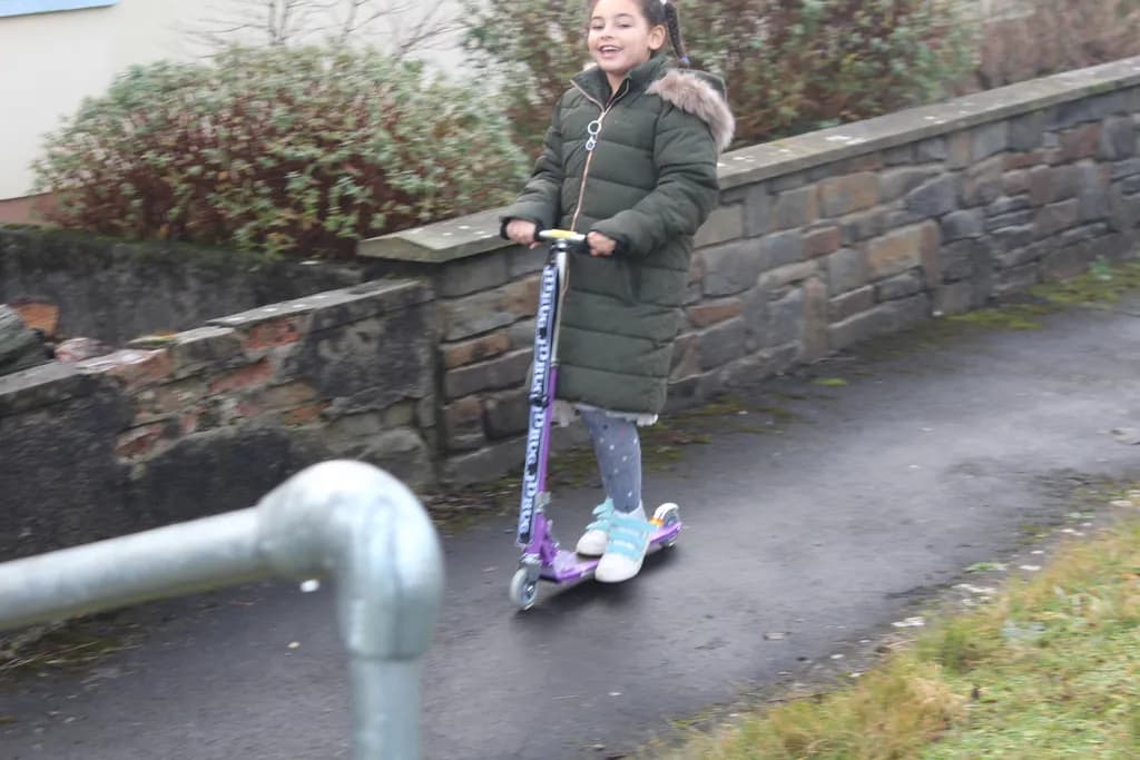 Child on Scooter Path