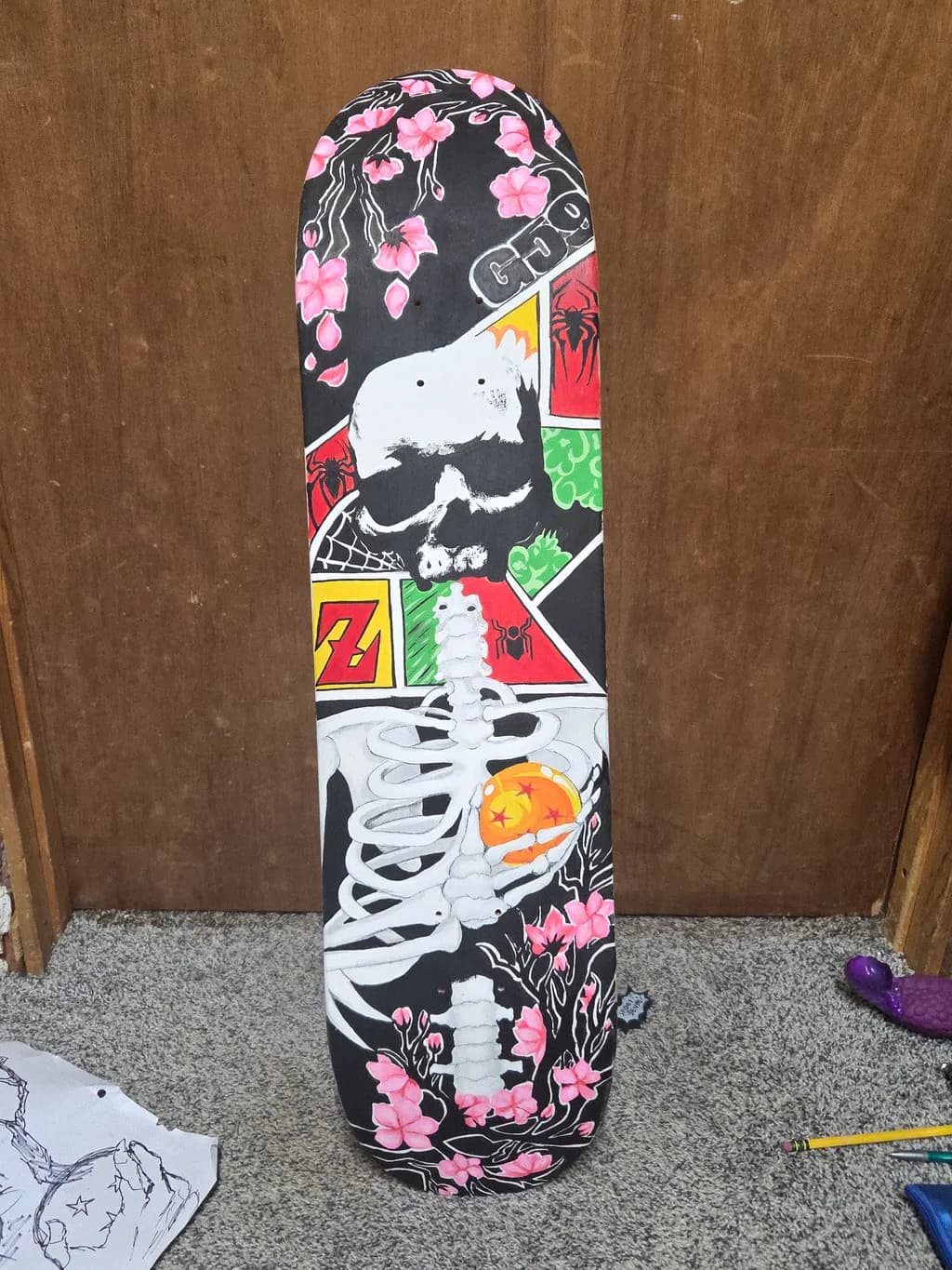 Skeleton and Blossoms Skateboard Deck