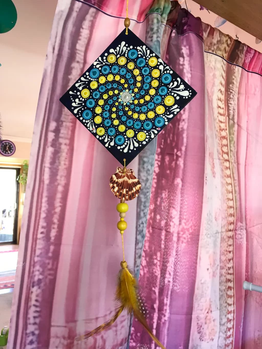 Mandala with Shell and Feathers
