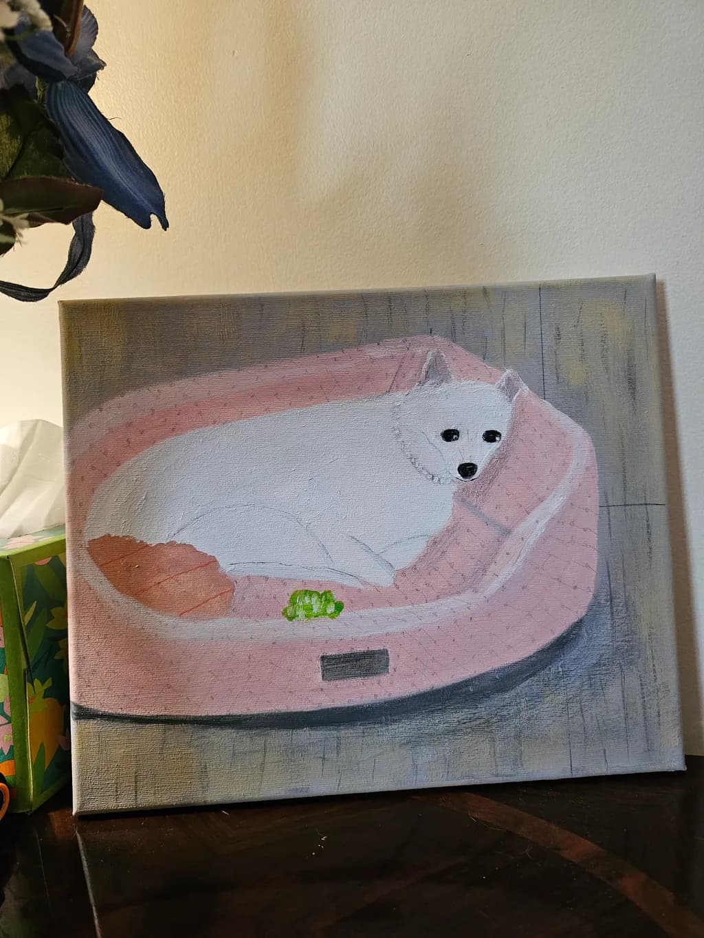 White Dog in Pink Bed