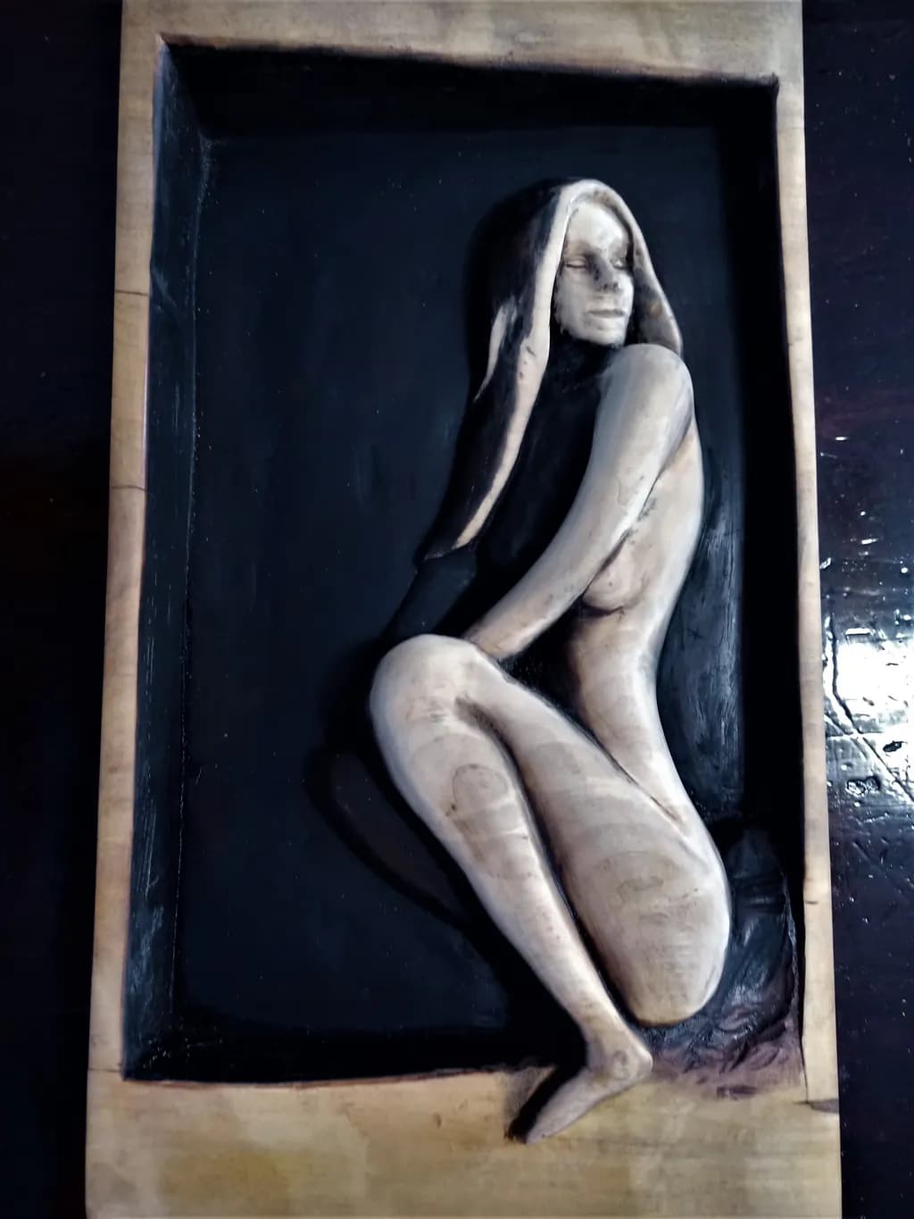 Wooden Figure in Frame