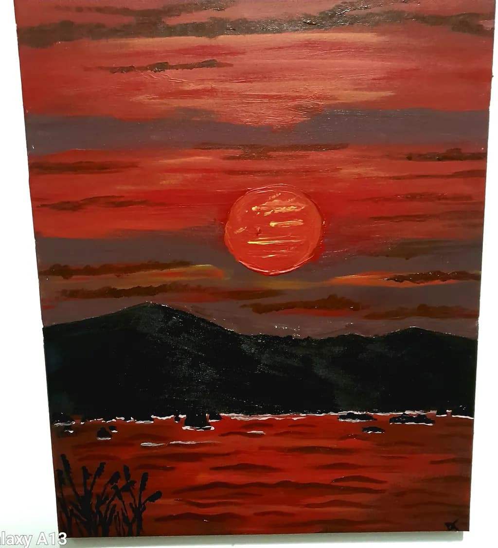Red Sun Over Mountains