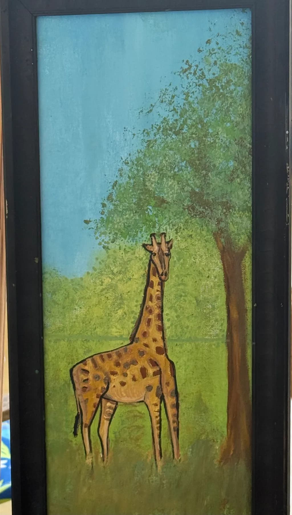 Giraffe by the Tree