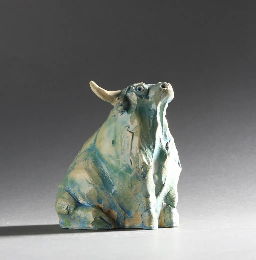 Contemplative Bull Sculpture