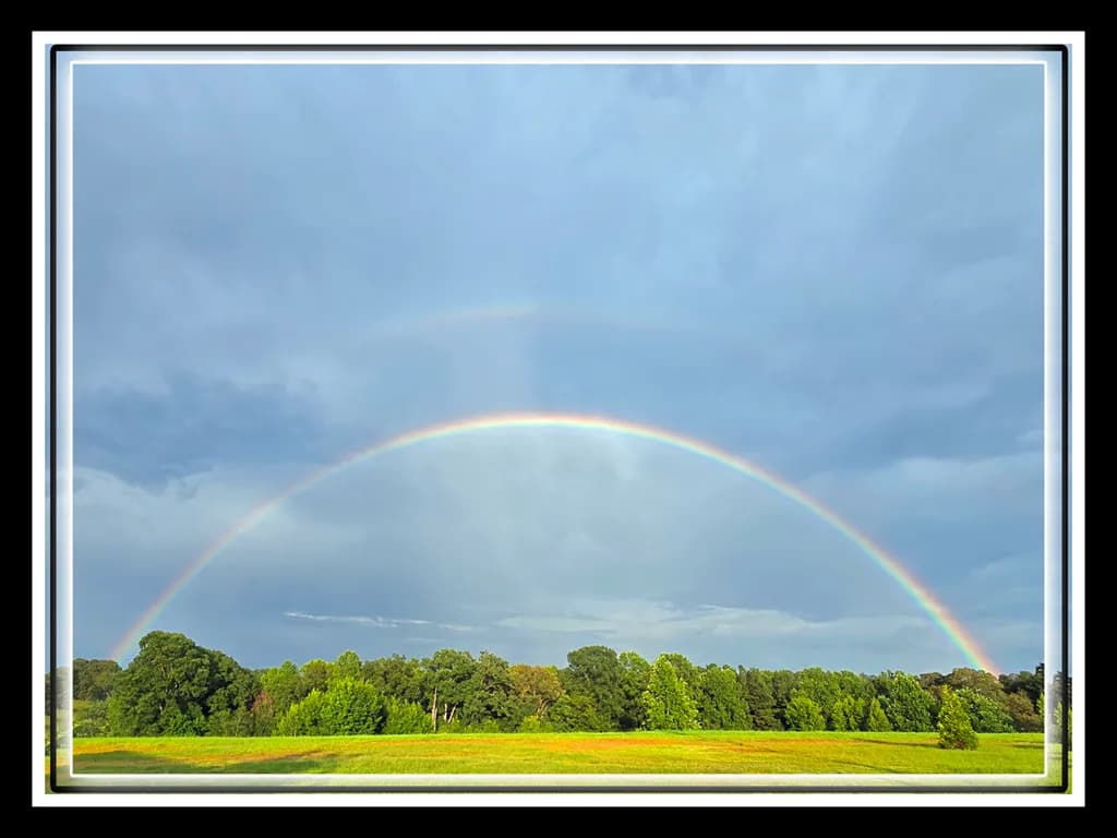 Rainbow Over Landscape