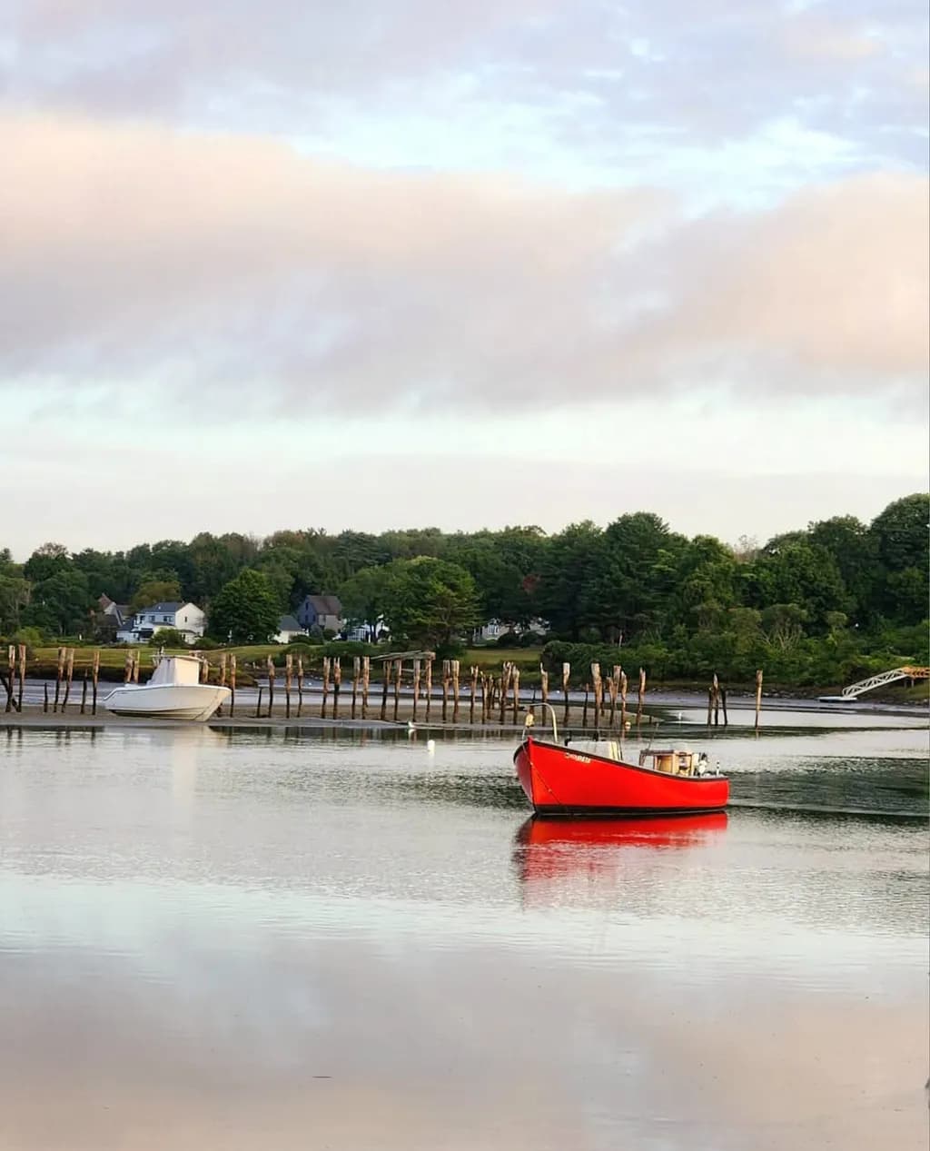 Red Boat on Calm Water