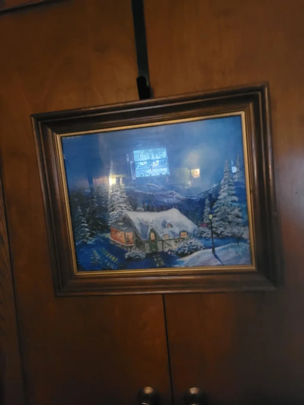 Snowy Cabin at Night