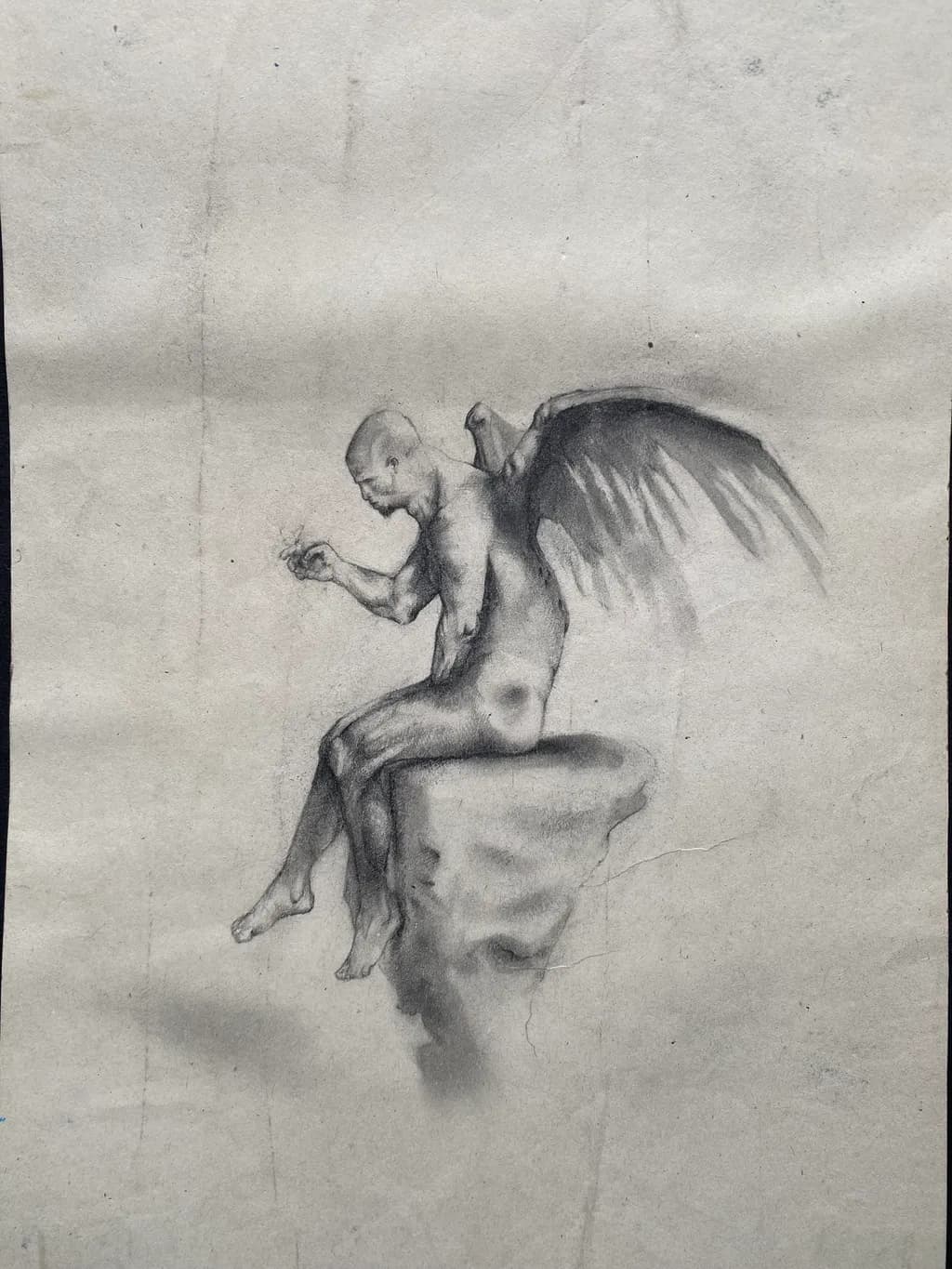 Winged Figure on Rock