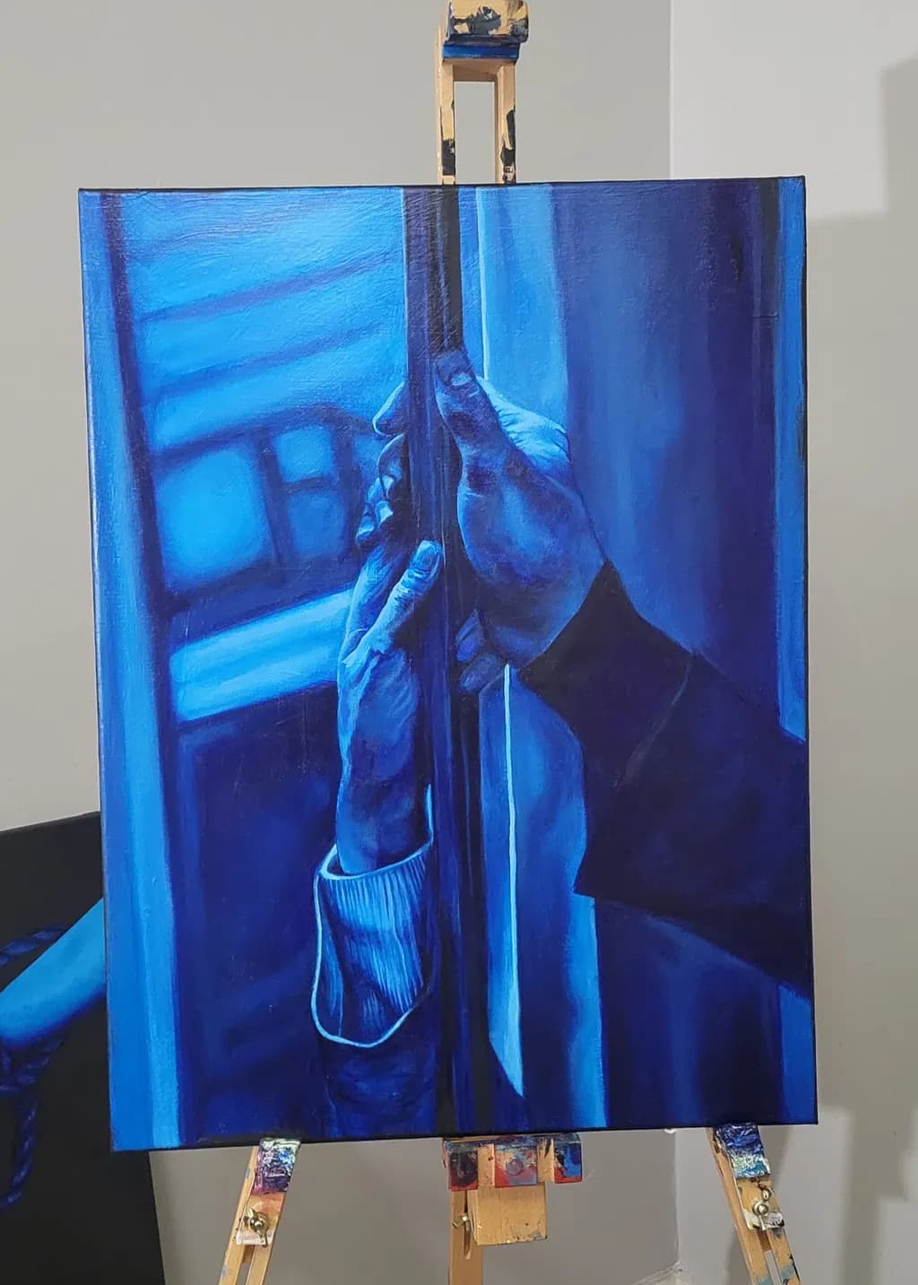 Hands Holding Pole