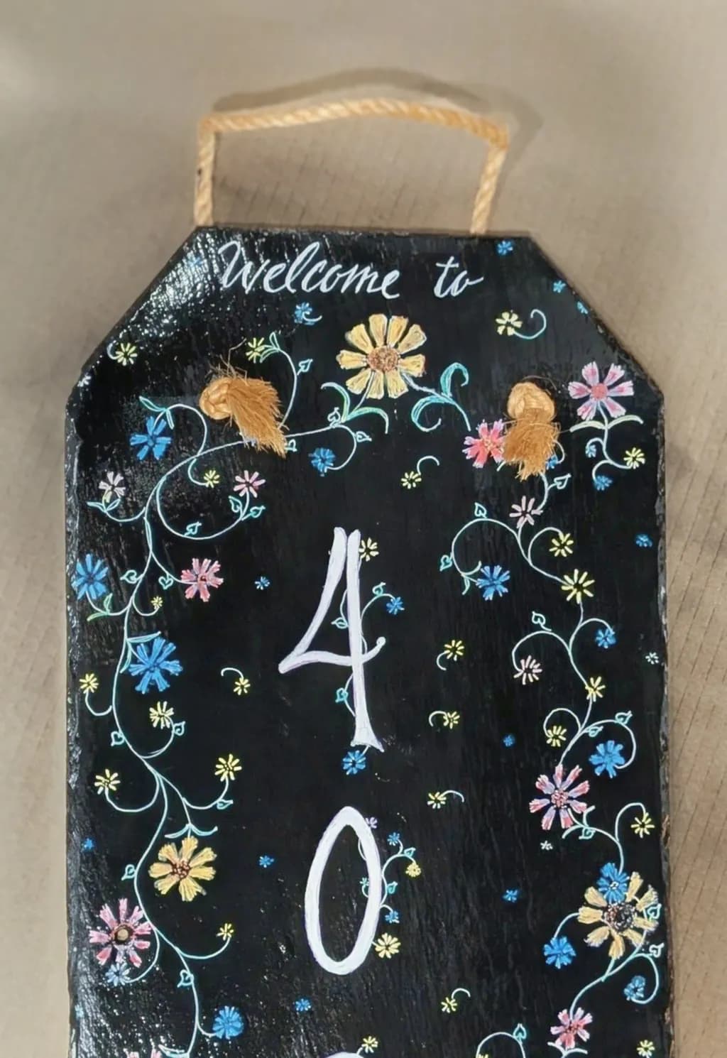 Welcome Sign with Flowers
