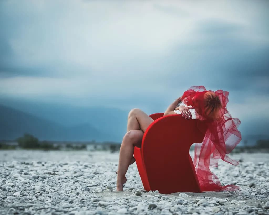 Red Chair on Pebbles