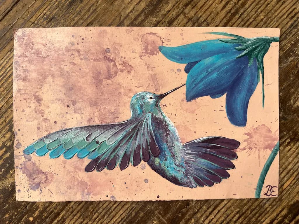 Hummingbird and Blue Flower