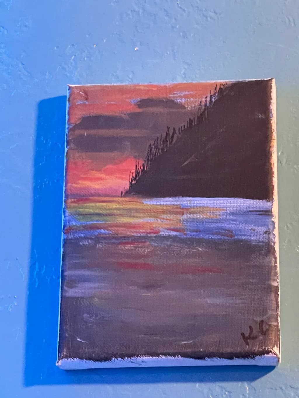 Sunset Over Water and Hill