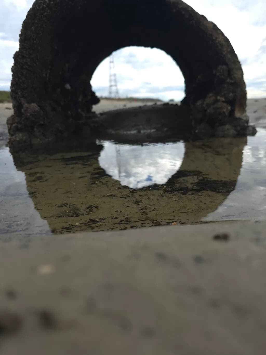 Rocky Shoreline Arch Reflection