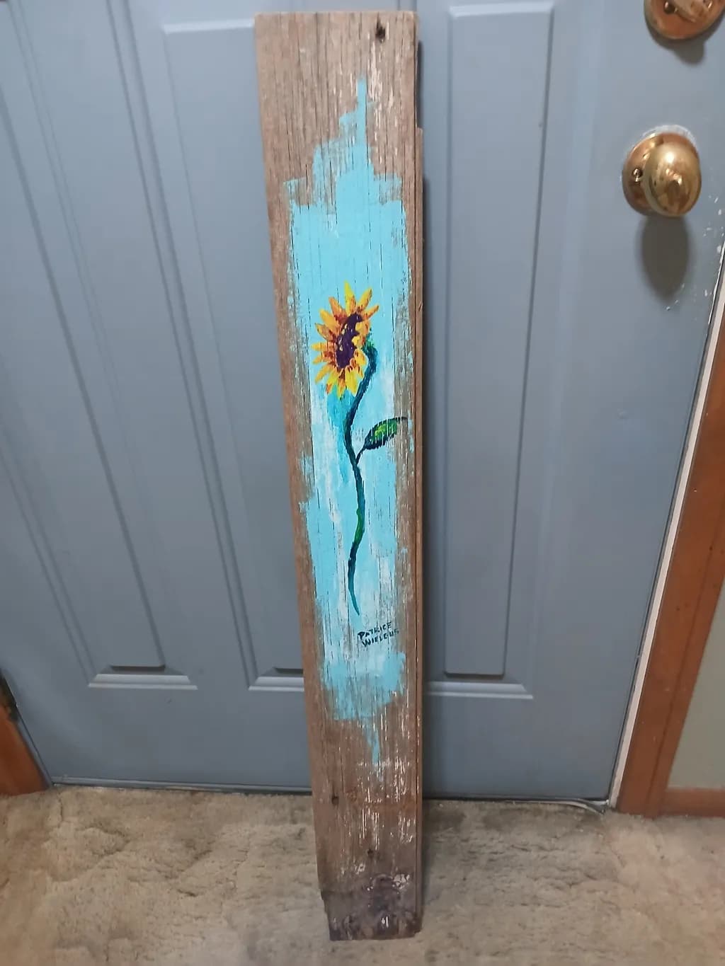 Sunflower on Weathered Wood