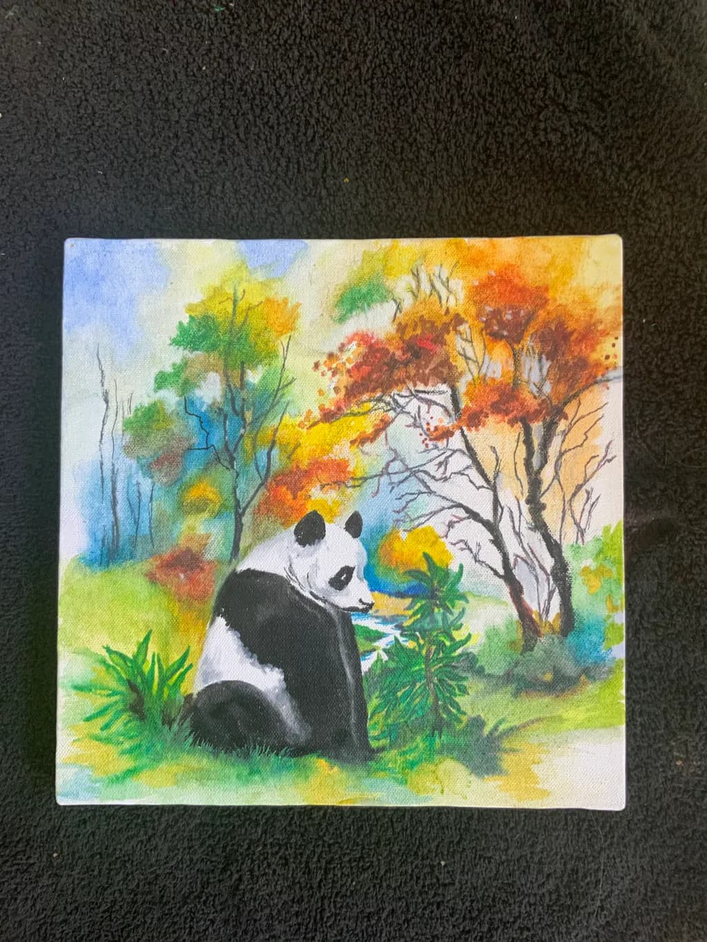 Panda in Autumn Forest
