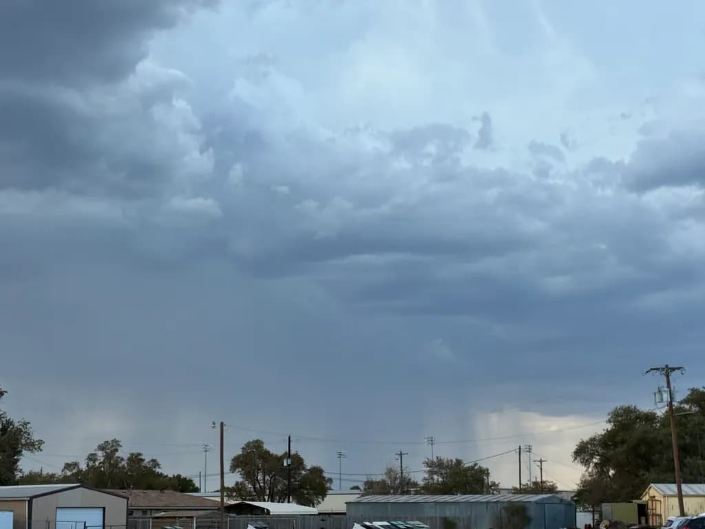 Stormfront Over Townscape