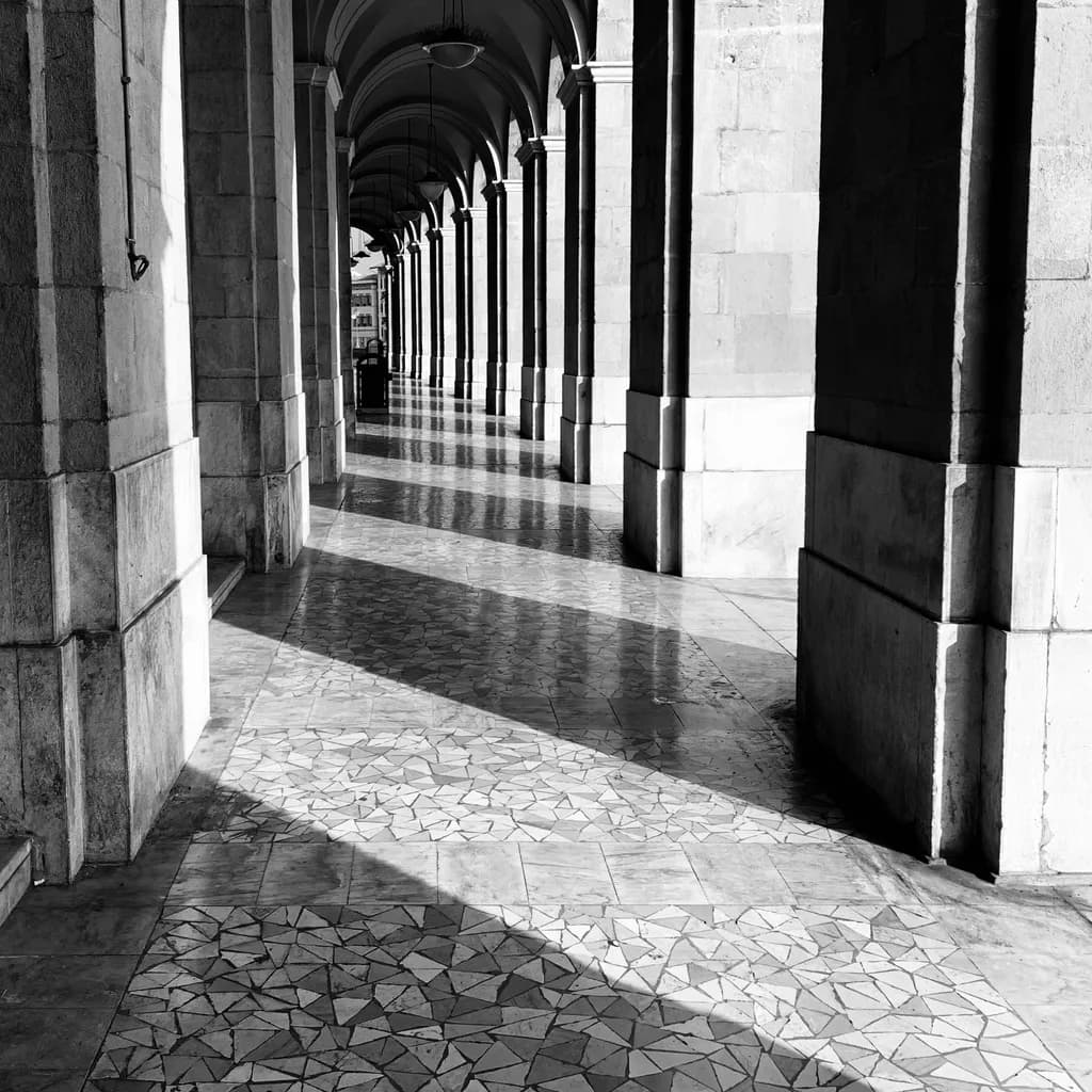 Sunlit Arcade Shadows