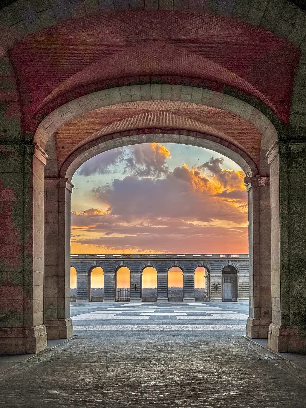 Whispers of Dawn: A Serene Archway Embracing the Sunrise