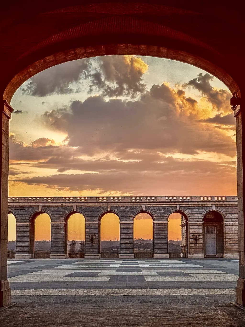 Golden Arches: A Sunset Symphony of Light and Stone