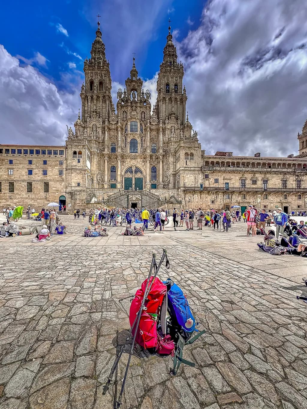 Journey's End: A Colorful Pause at Santiago de Compostela's Majestic Facade