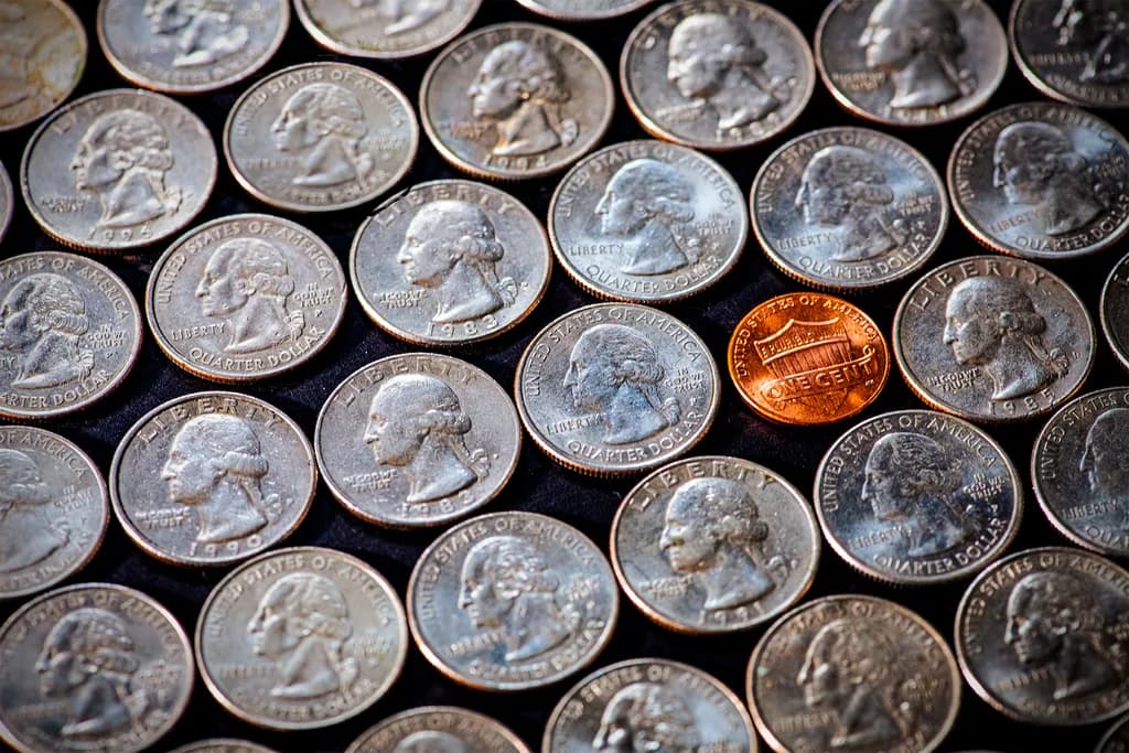 One Cent Penny among Quarters