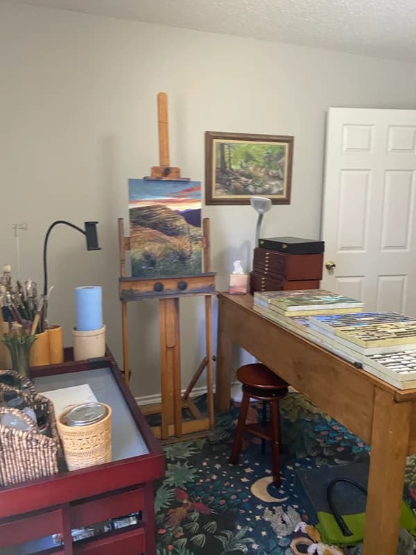 Pastel sticks stay lined up on a table to my right, with oil paints and brushes and my palette on a cabinet to my left. There's just enough room fro me to mosey up to my easel and choose which medium I'll paint with next.,