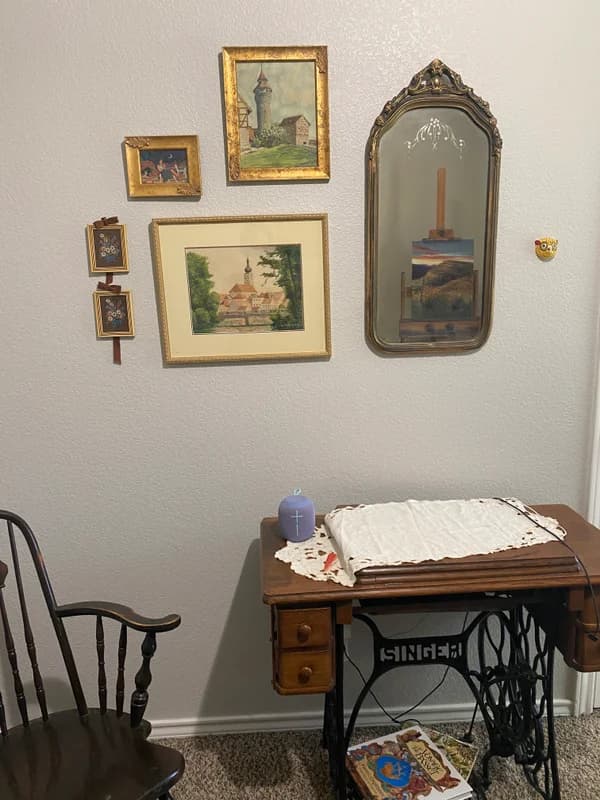 Family heirlooms make my studio a welcoming place. My computer desk is my grandmother's old Singer sewing machine! I keep all clutter out of the studio so I only see things I love.