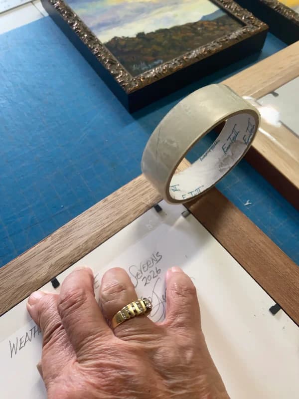 I keep a table with a self-healing cutting board on it and that space is dedicated to framing. Nothing else allowed on it! All my tools are in a basket on the corner.