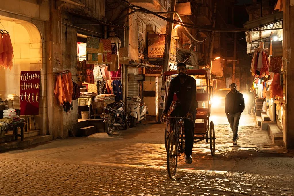 Bicycler in Delhi Street