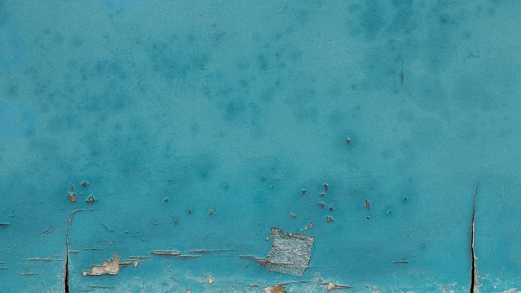 Whimsical Waves of Worn Blue: A Journey Through Time and Texture