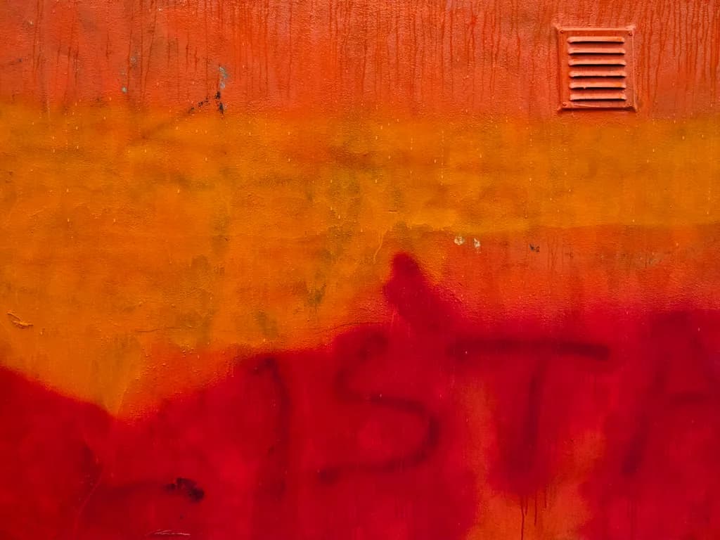 Vibrant Echoes: An Abstract Journey Through Texture and Color in Graffiti Art