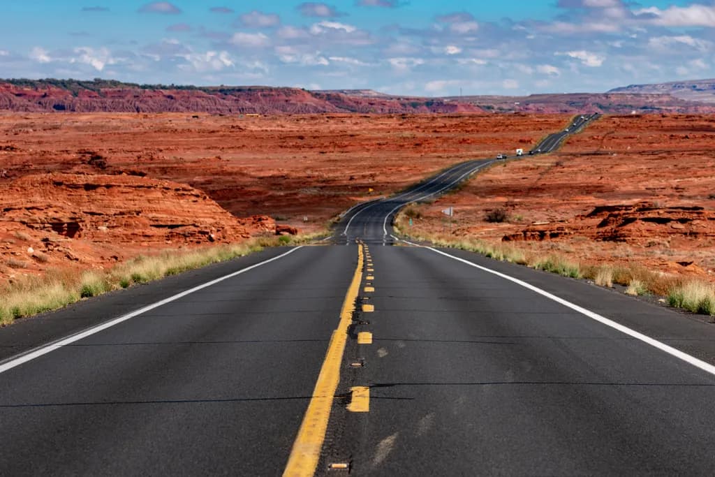 Endless Journey Through the Desert: A Scenic Road Landscape Adventure