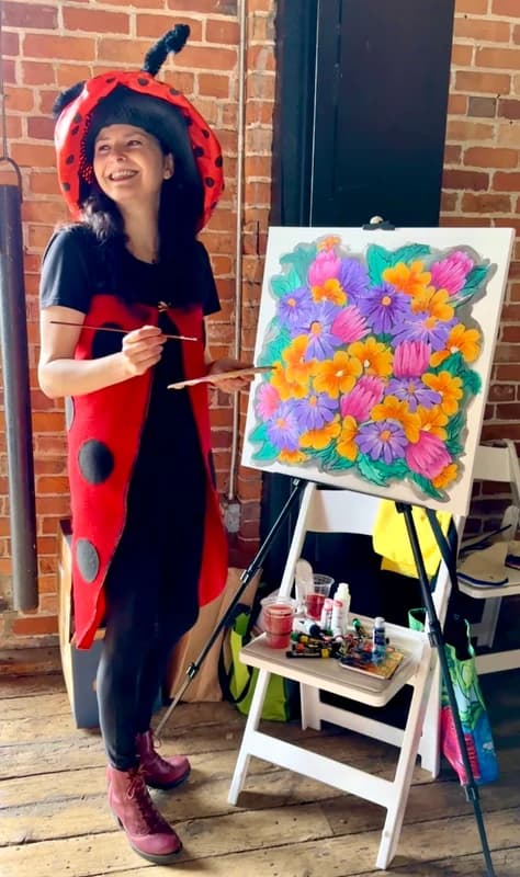 Live painting in my Ladybug costume at Earth Day Festival