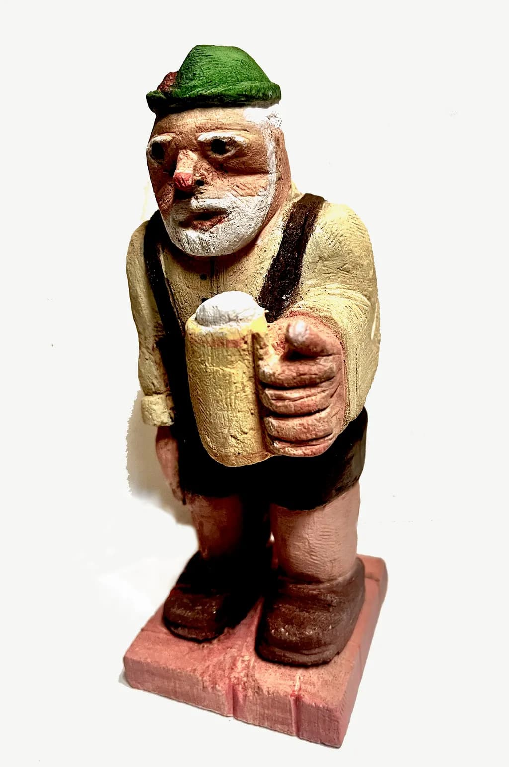 Cheers to the Good Life: A Whimsical Carved Companion with a Mug in Hand